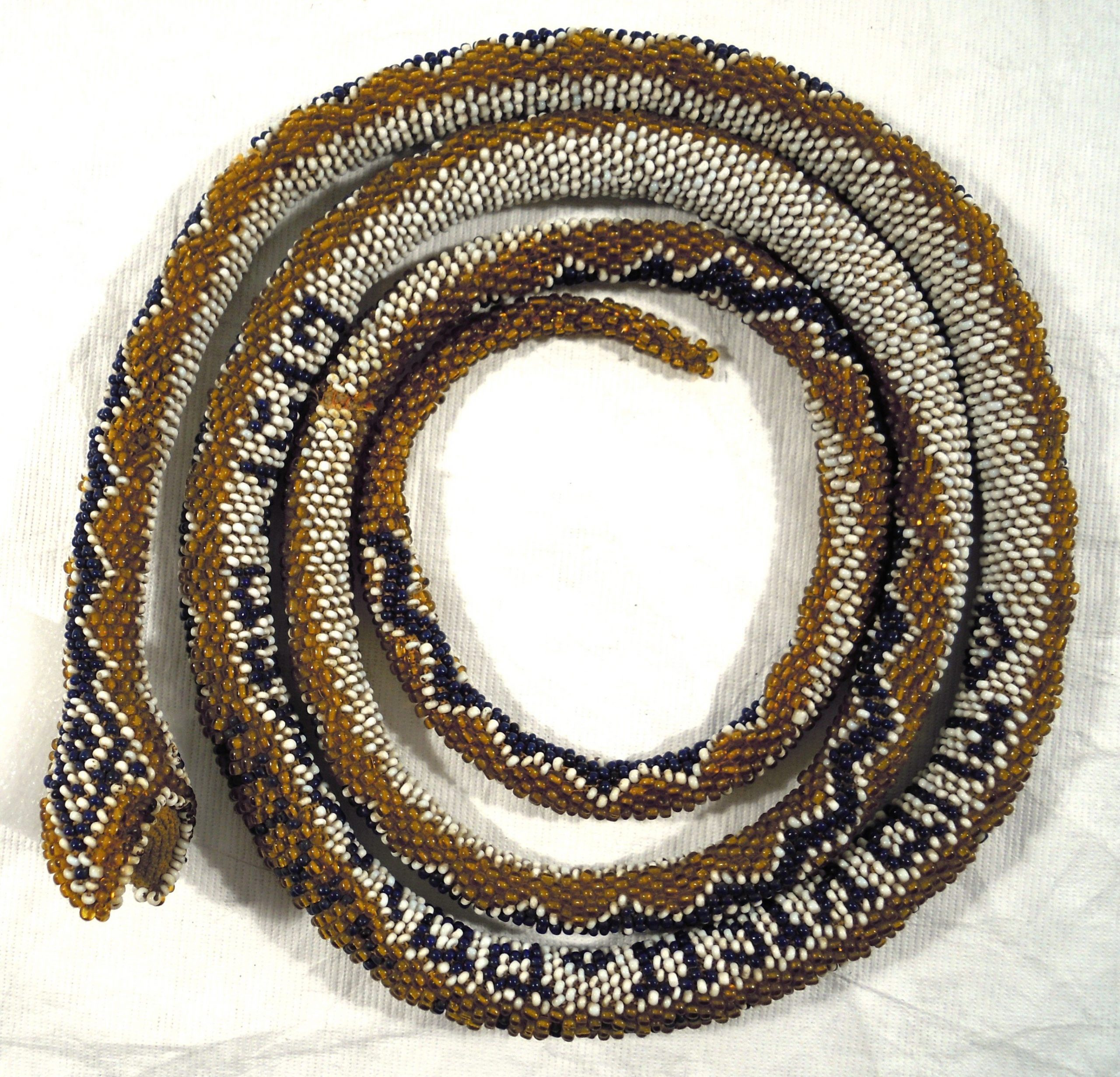 1992.677 Beaded Snake, Trench Art, WWI